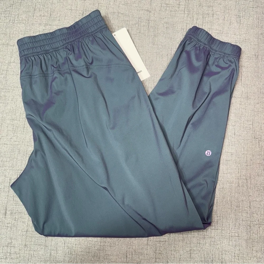 Lululemon Iridescent Tearaway Mid Rise Track Pant Tidewater Teal Purple 12 NWT